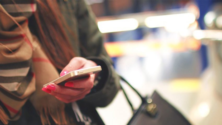 Women holding smartphone