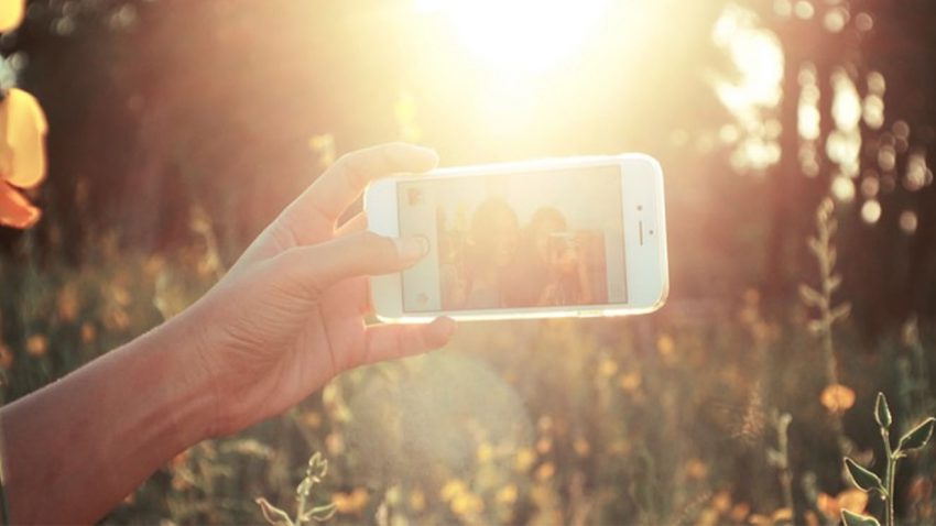 Two people taking selfie